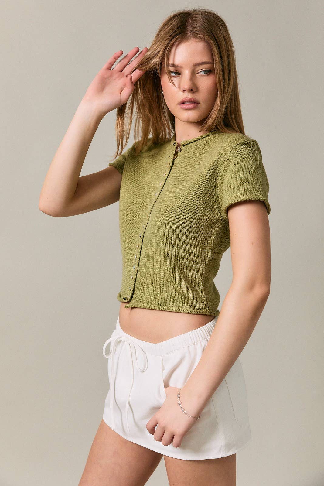 CAP SLEEVE ROUND NECK BUTTON DOWN SWEATER TOP